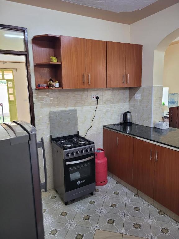 Kuchyň nebo kuchyňský kout v ubytování Gloria House
