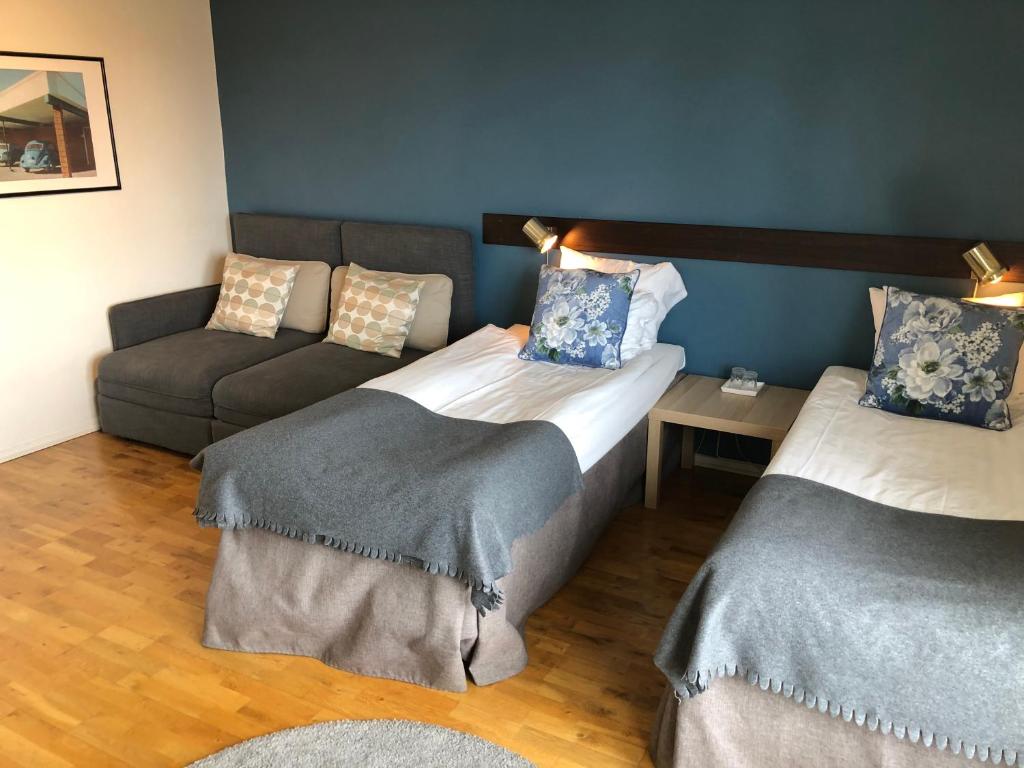 Postel nebo postele na pokoji v ubytování Vätterleden Hotell & Restaurang