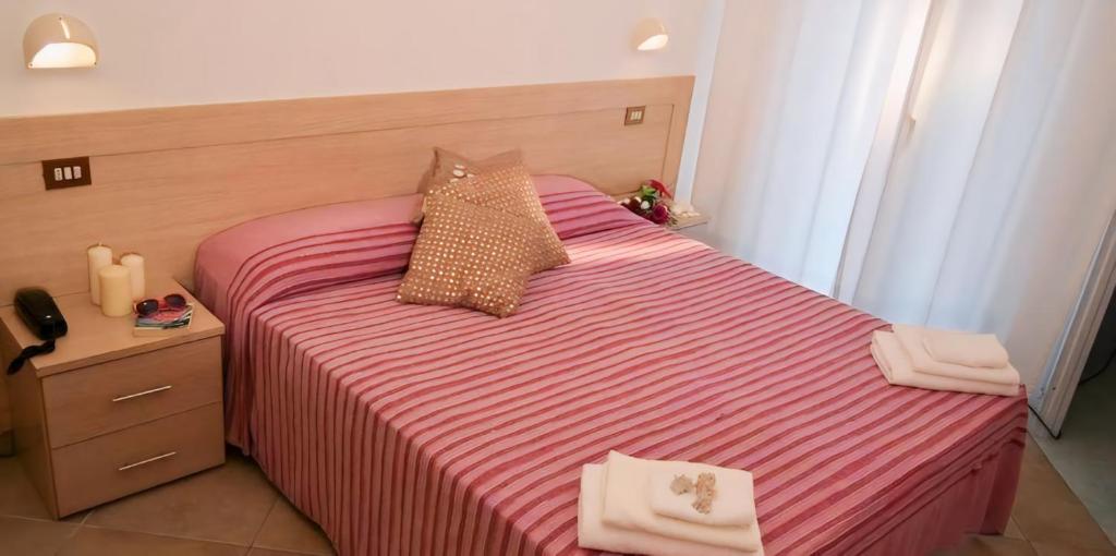 Postel nebo postele na pokoji v ubytování Hotel Baltic