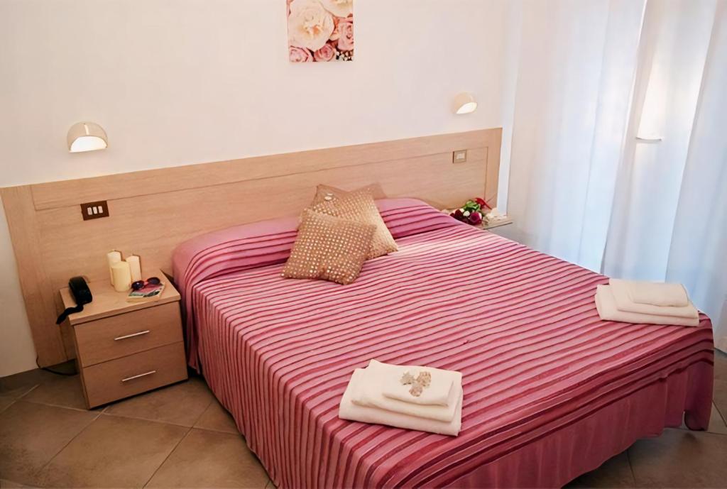 Postel nebo postele na pokoji v ubytování Hotel Baltic