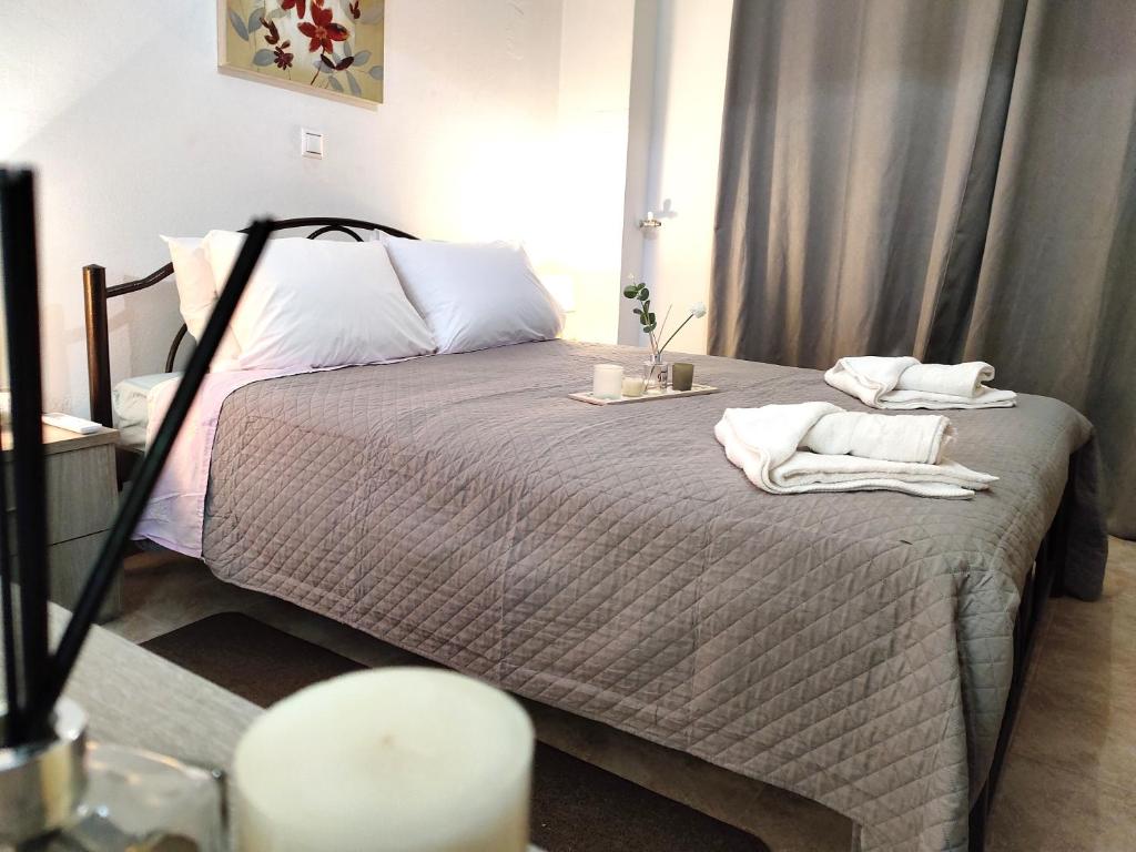 Postel nebo postele na pokoji v ubytování Bellos Corfu Center Apartment