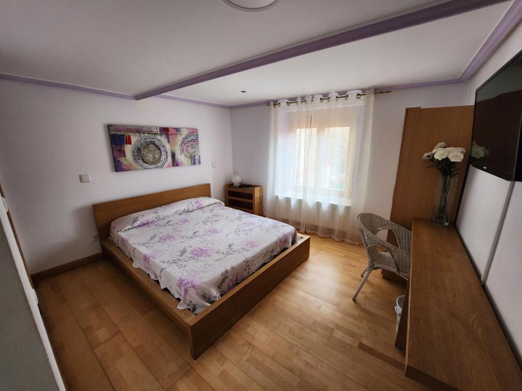 Кровать или кровати в номере Caminante