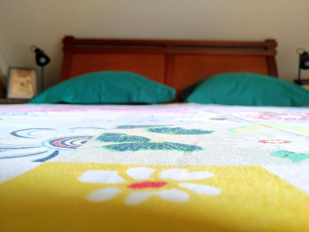 Postel nebo postele na pokoji v ubytování Eskal Péi - Auberge de Jeunesse & Chambres d'hôtes