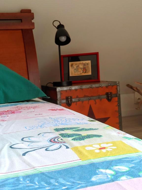 Postel nebo postele na pokoji v ubytování Eskal Péi - Auberge de Jeunesse & Chambres d'hôtes