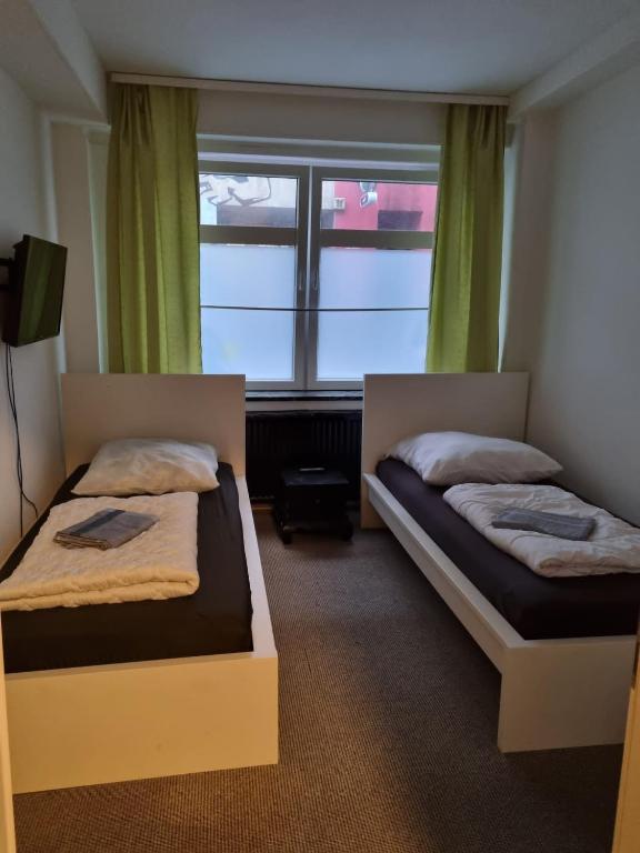 Postel nebo postele na pokoji v ubytování Paulibude