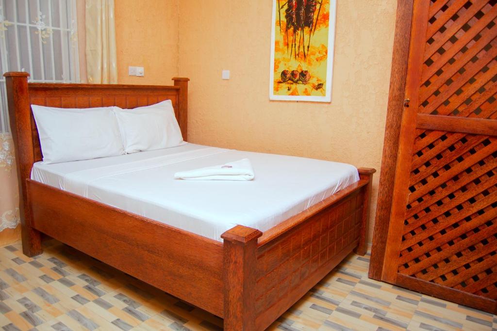 Postel nebo postele na pokoji v ubytování Best Point Hotel Zanzibar