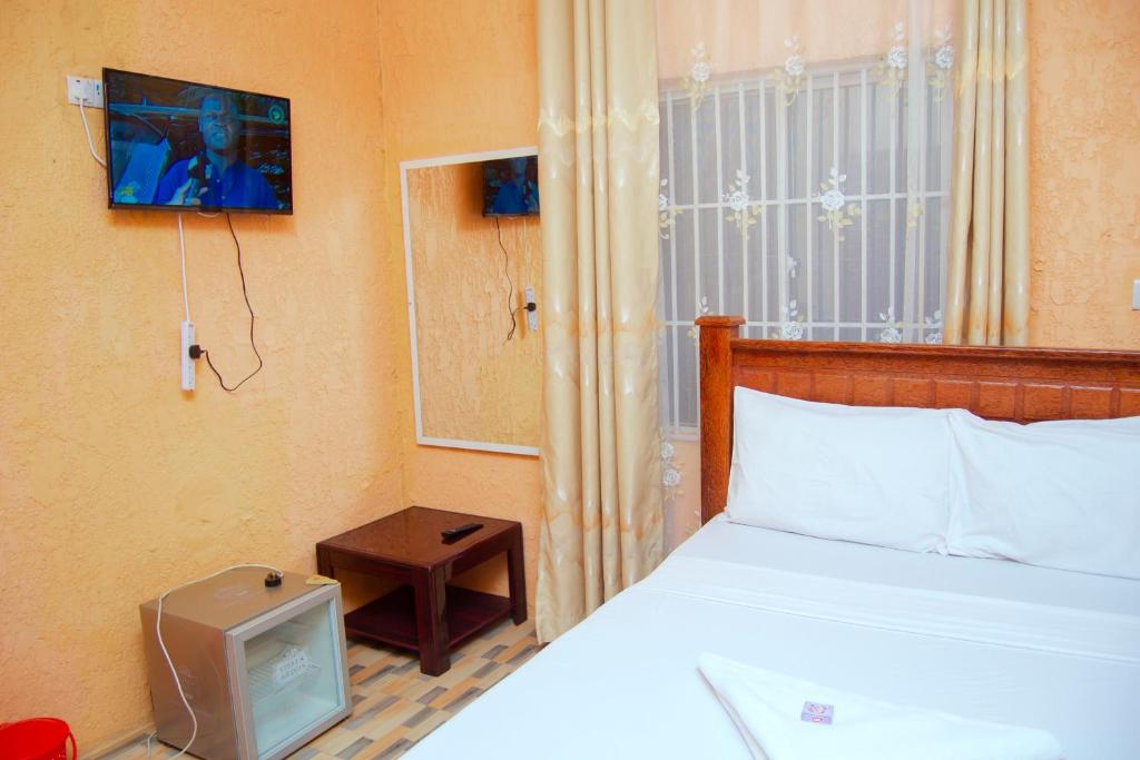 Postel nebo postele na pokoji v ubytování Best Point Hotel Zanzibar