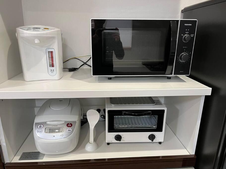 湘南片瀬HOMEにあるキッチンまたは簡易キッチン