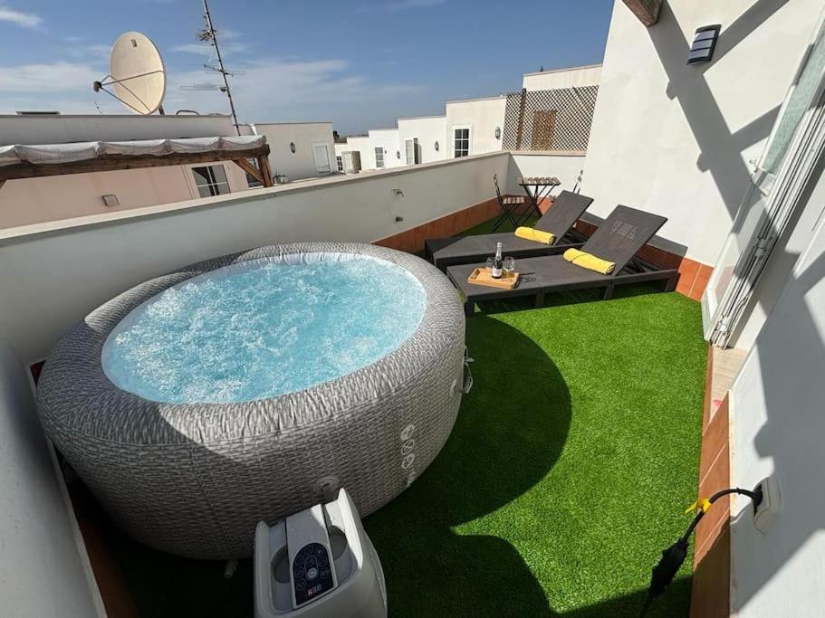 a swimming pool on the roof of a building at Villa Buenavistas in Adeje