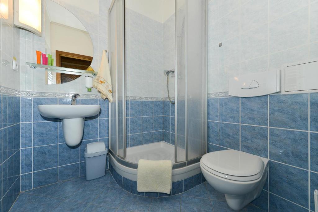 Koupelna v ubytování Hotel Trilobit