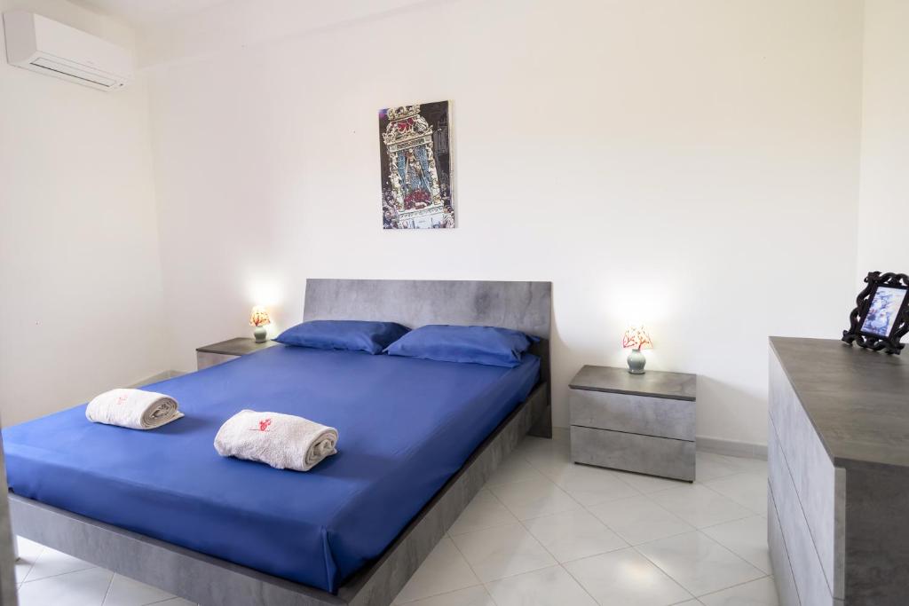 Letto o letti in una camera di !!! 2 MIN DALLA SPIAGGIA !!! - Casa Vacanze Coralli