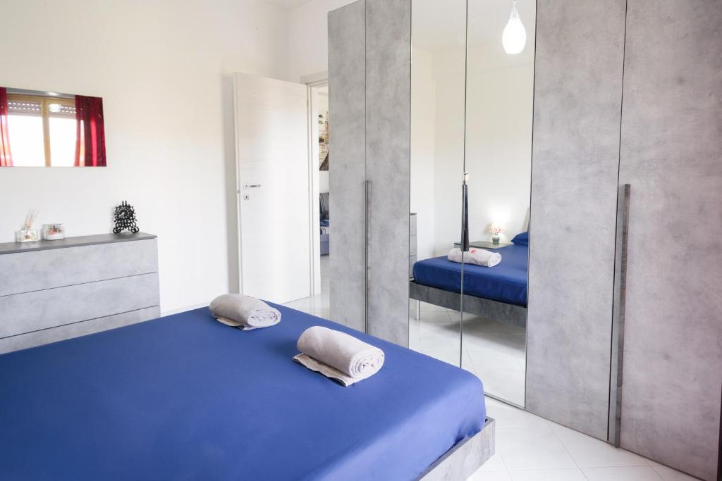 Letto o letti in una camera di !!! 2 MIN DALLA SPIAGGIA !!! - Casa Vacanze Coralli