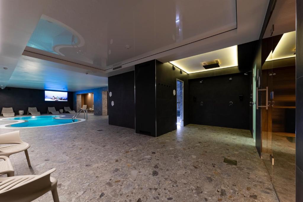 TV a/nebo společenská místnost v ubytování U11 Hotel & SPA