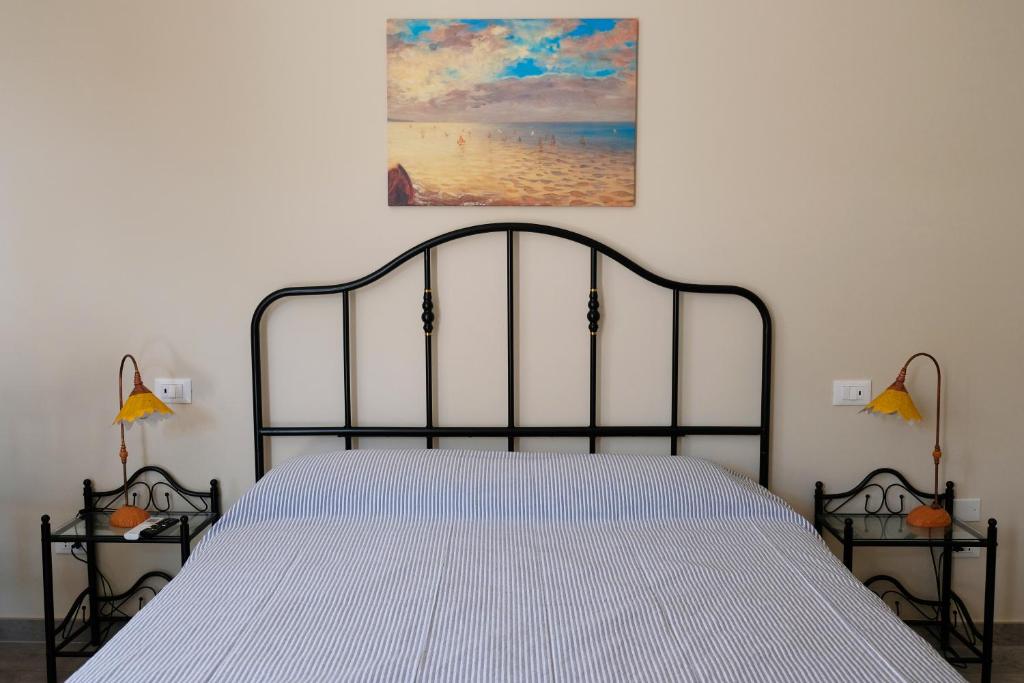 Postel nebo postele na pokoji v ubytování B&B Relais Radoccia