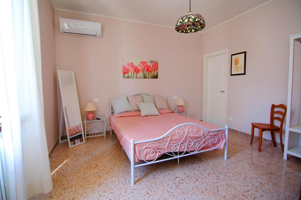 Postel nebo postele na pokoji v ubytování B&B Relais Radoccia