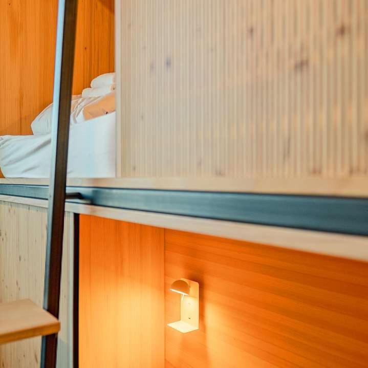 Postel nebo postele na pokoji v ubytování Silo Design & Boutique Hostel Basel