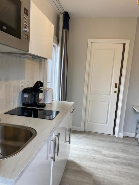 Kuchyň nebo kuchyňský kout v ubytování Villa 418