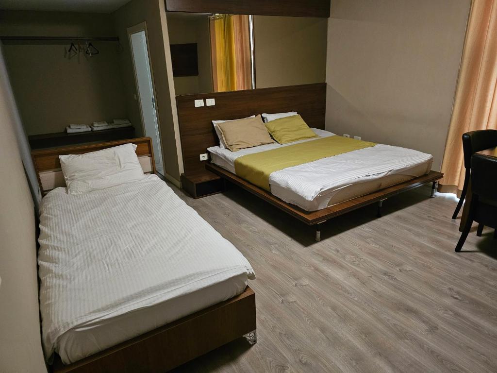 Postel nebo postele na pokoji v ubytování HOTEL BENITA