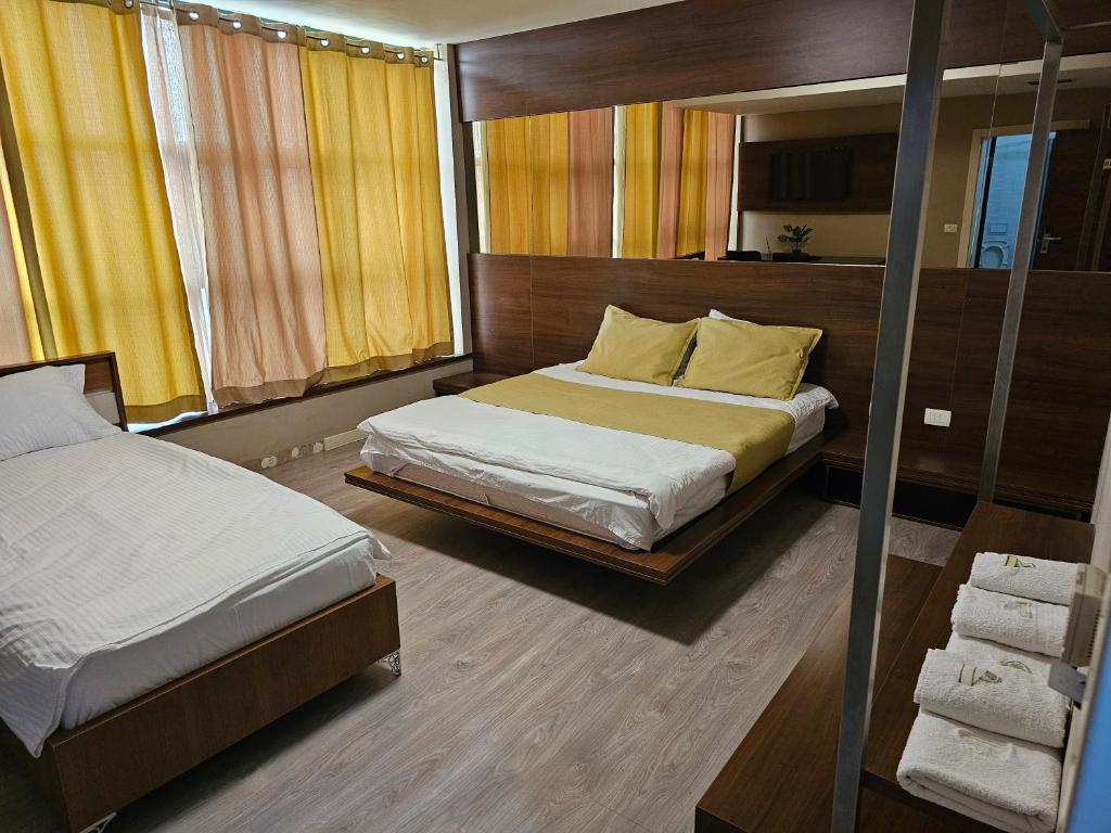 Postel nebo postele na pokoji v ubytování HOTEL BENITA