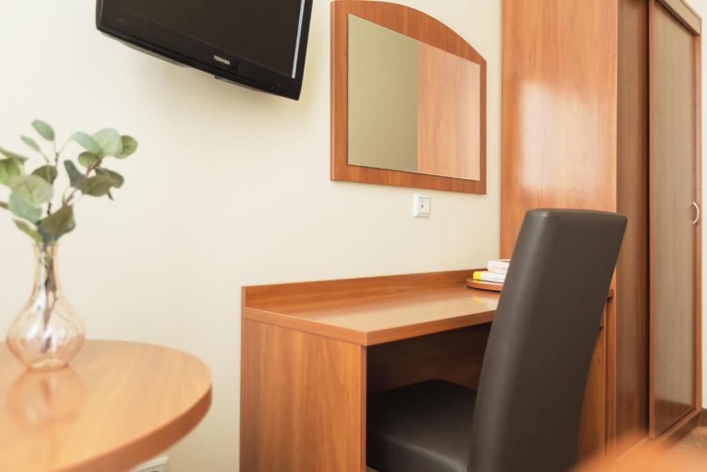 TV a/nebo společenská místnost v ubytování Hotel Alte Wache
