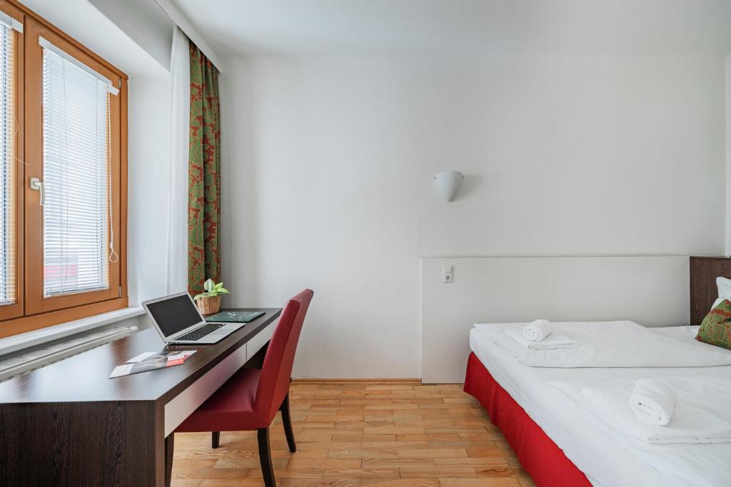 Posteľ alebo postele v izbe v ubytovaní Serviced Apartments Josefstadt City