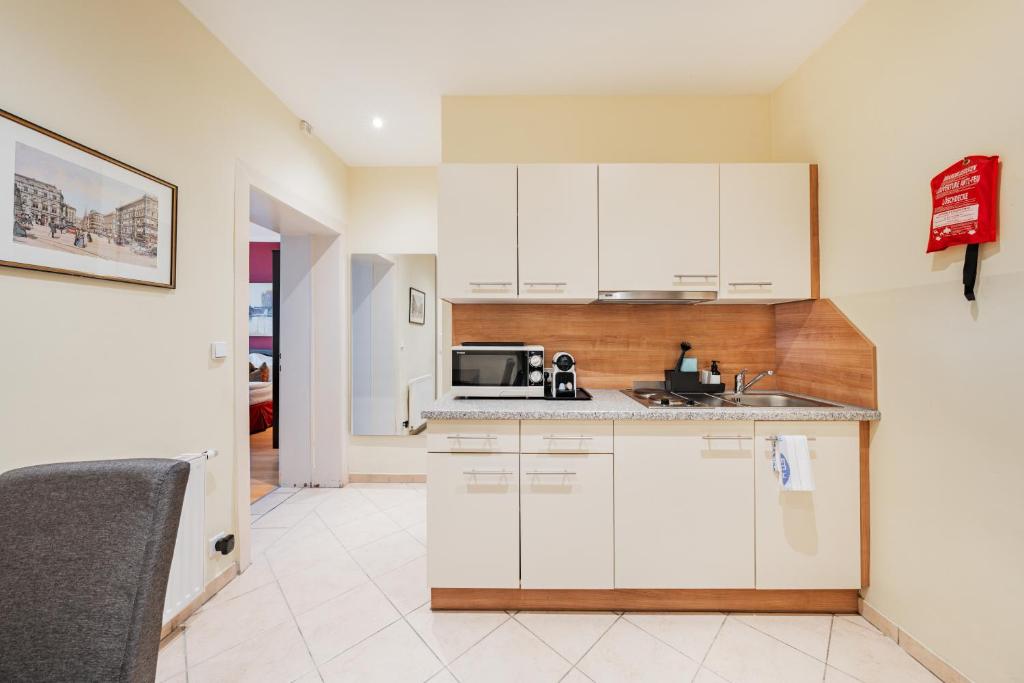 Kuchyňa alebo kuchynka v ubytovaní Serviced Apartments Josefstadt City
