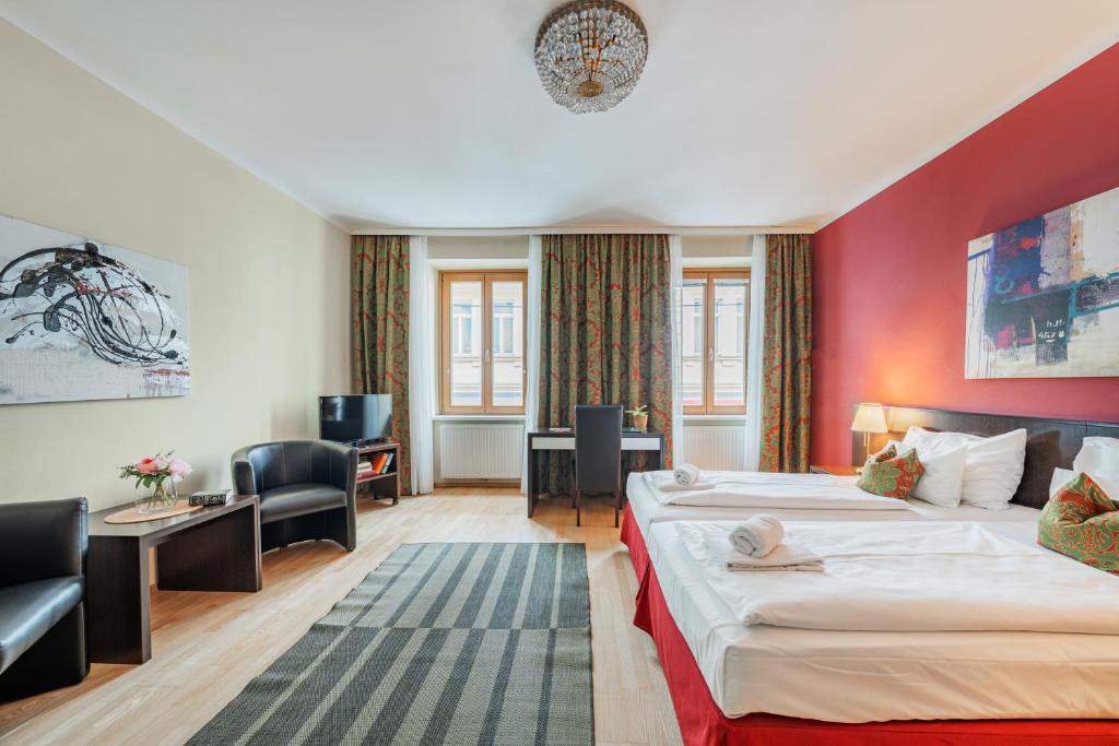 Posteľ alebo postele v izbe v ubytovaní Serviced Apartments Josefstadt City