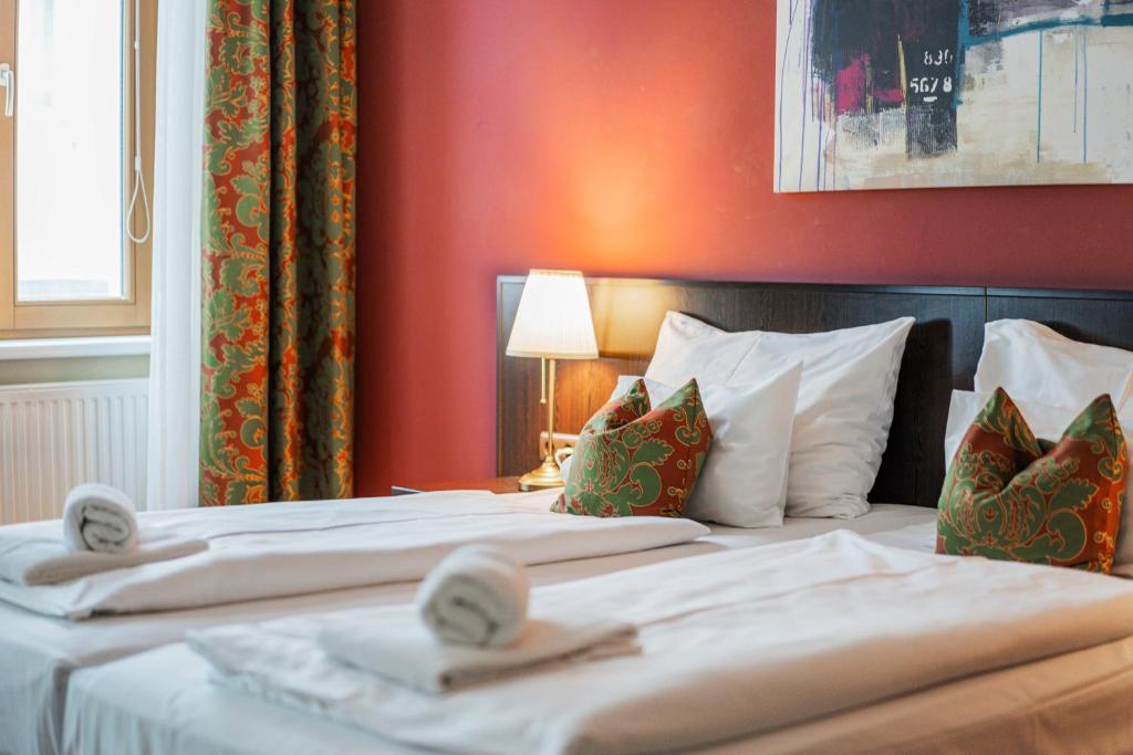 Posteľ alebo postele v izbe v ubytovaní Serviced Apartments Josefstadt City