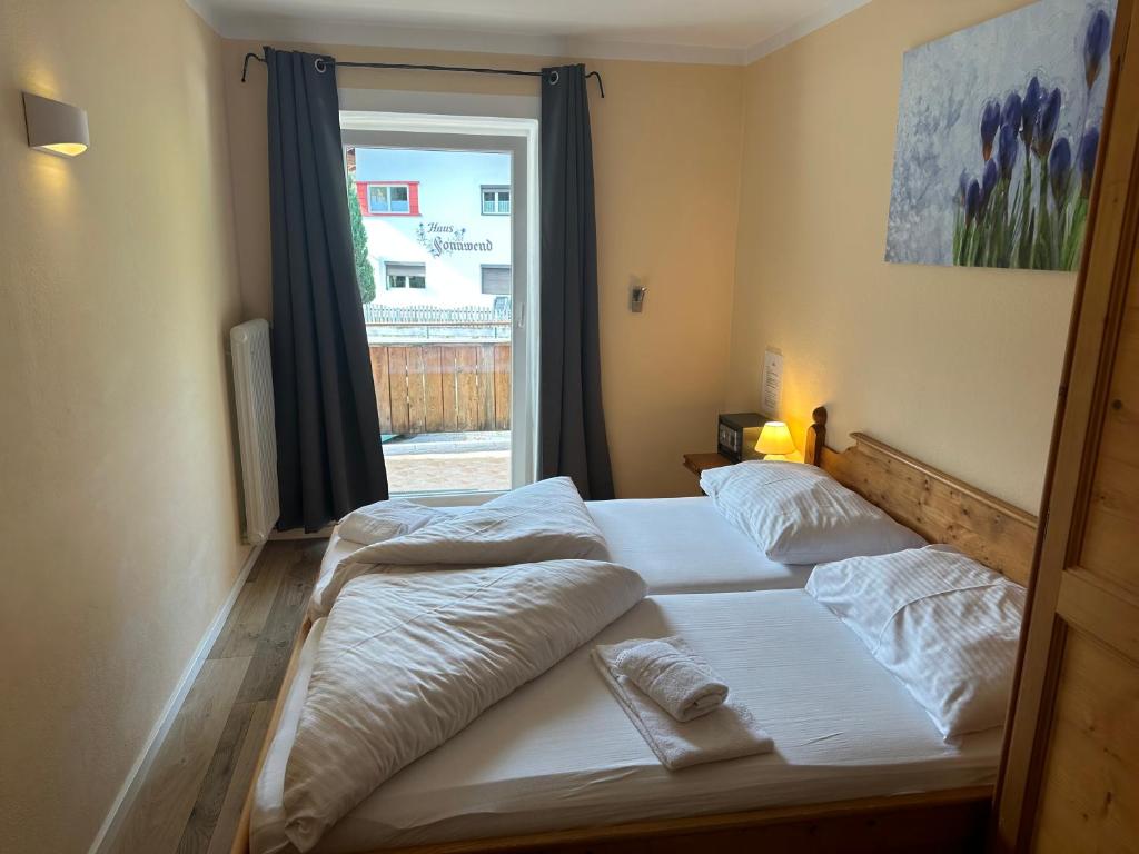 Posteľ alebo postele v izbe v ubytovaní Alpenlodge, Ferienwohnung 3