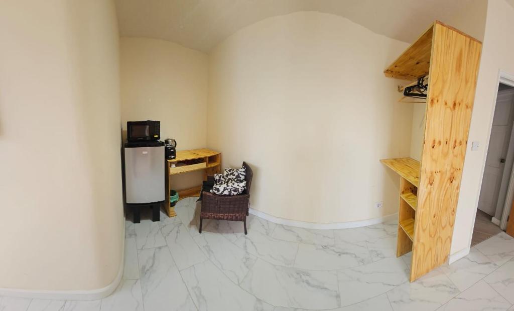 Kuchyň nebo kuchyňský kout v ubytování ShkyBlue Suites