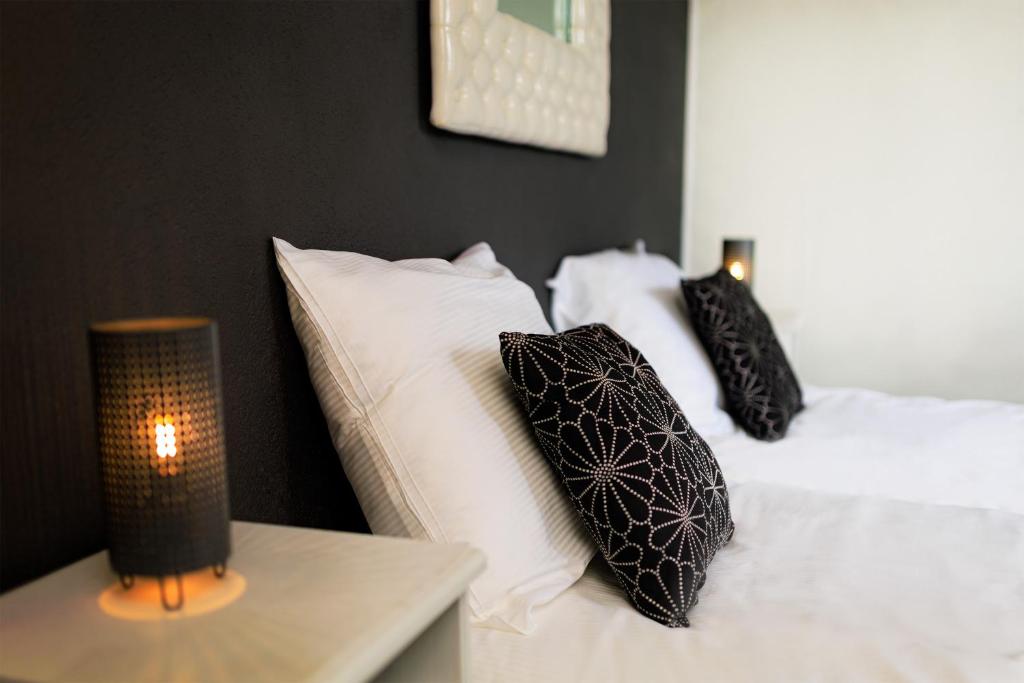 Postel nebo postele na pokoji v ubytování Hotel Berg en Bos