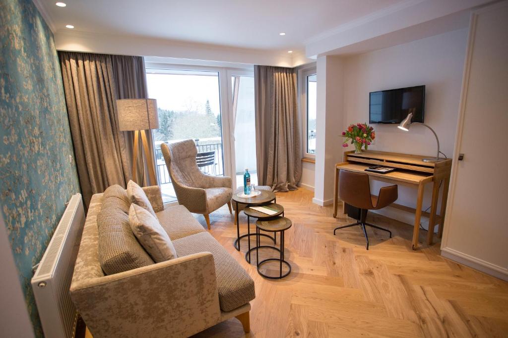 Een zitgedeelte bij Hotel Jagdhaus Wiese