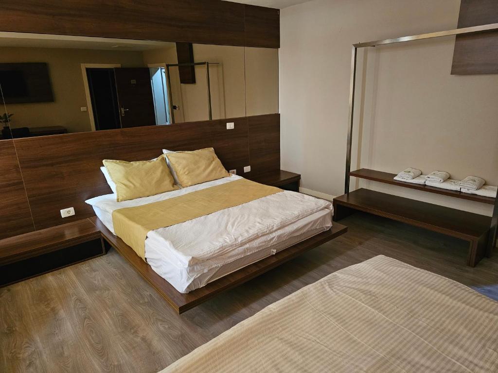 Postel nebo postele na pokoji v ubytování HOTEL BENITA
