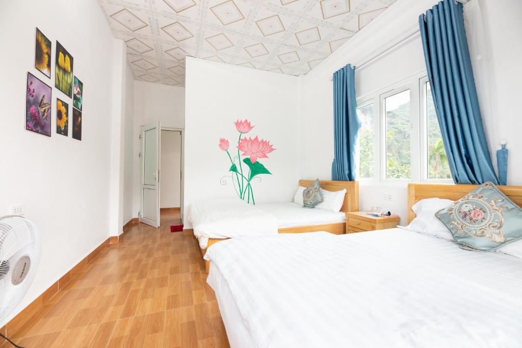 Postel nebo postele na pokoji v ubytování Cat Ba Countryside Homestay