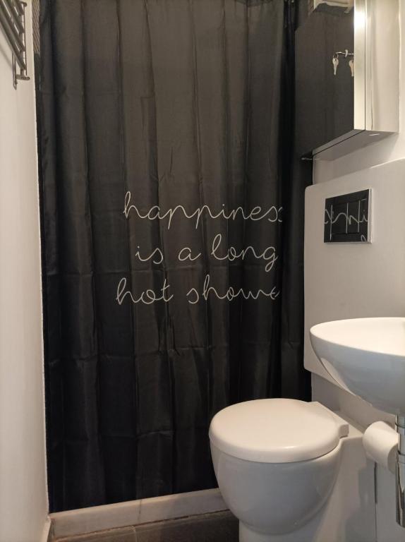 A bathroom at Myron Apartments