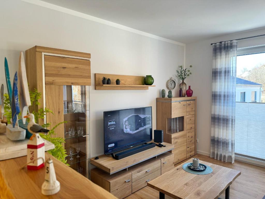 TV a/nebo společenská místnost v ubytování Sassnitz WE 14 Baumwipfelnest