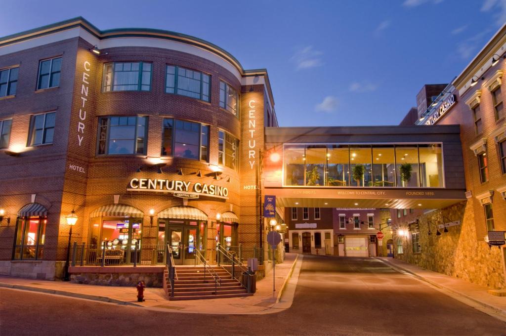 a group of buildings on a street at night at Century Casino & Hotel - Central City in Central City