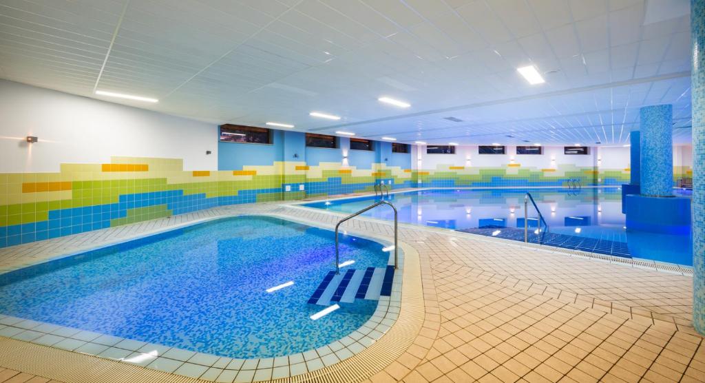 Der Swimmingpool an oder in der Nähe von Remisens Hotel LUCIJA