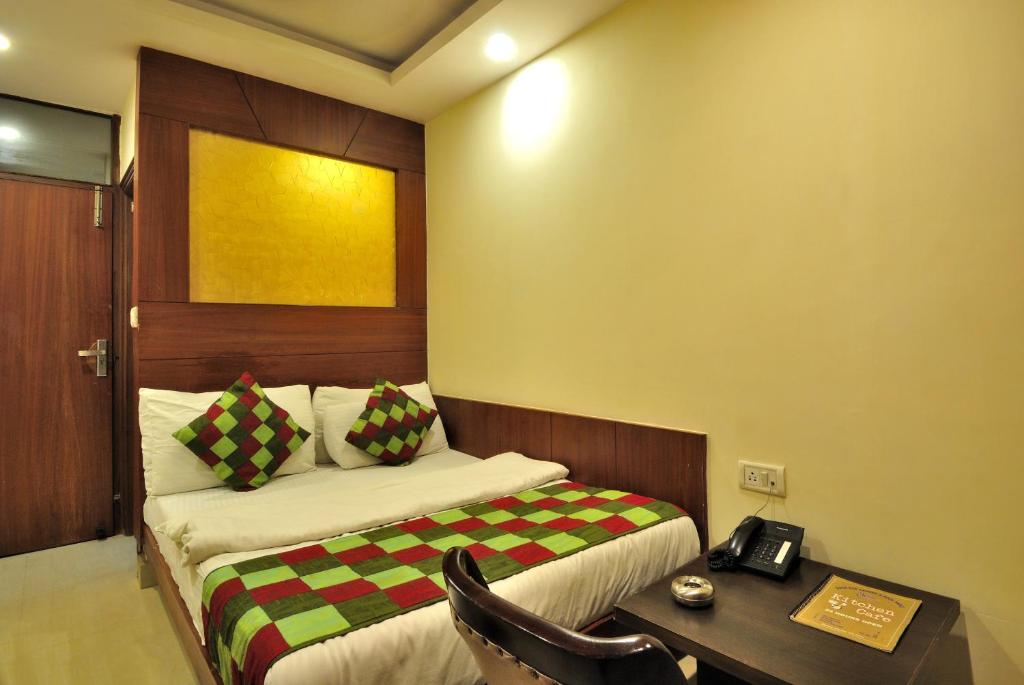 Postel nebo postele na pokoji v ubytování Hotel Shelton