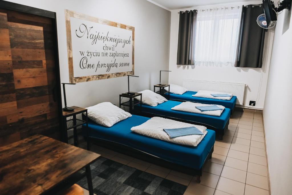 Noclegi Bielpon - Lit Simple Dans La Salle De Dortoir Masculin