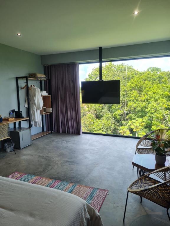 TV a/nebo společenská místnost v ubytování Hotel Piedra Mulata - Adults Only