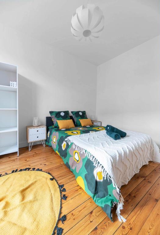 Un ou plusieurs lits dans un hébergement de l'établissement L'Eugène - Maison 3 chambres
