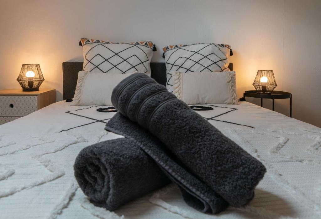 Un ou plusieurs lits dans un hébergement de l'établissement L'Eugène - Maison 3 chambres