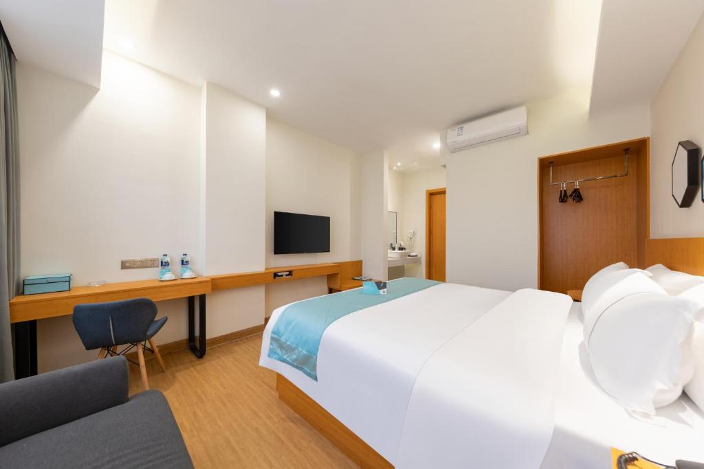 Postel nebo postele na pokoji v ubytování Xana Lite Hotel - Guangzhou Fangcun Huadiwan Metro Station
