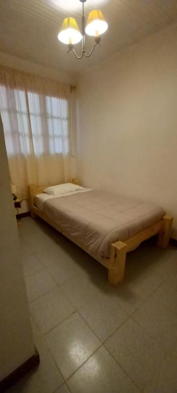 Voodi või voodid majutusasutuse Terrandino Hostel toas