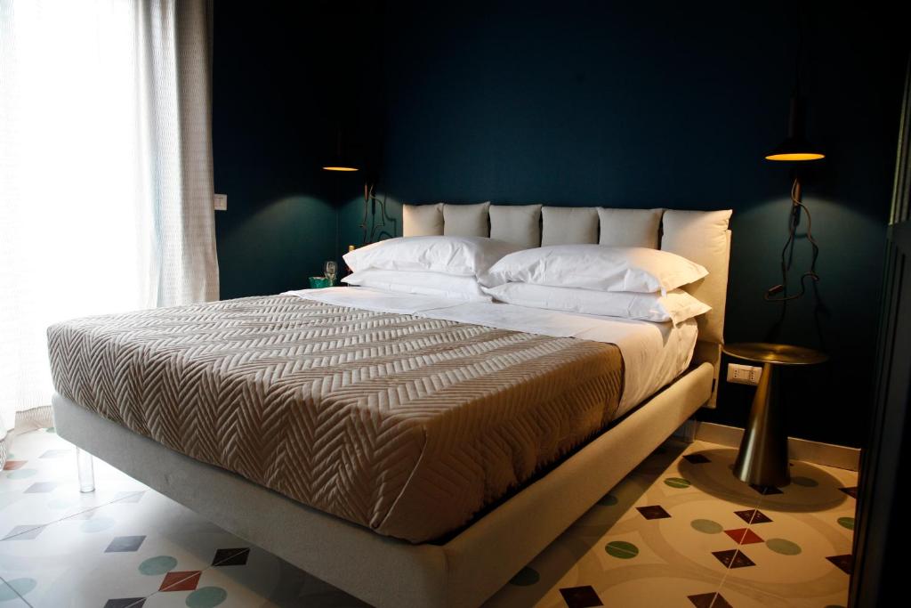 Postel nebo postele na pokoji v ubytování B & B Casa Portanova