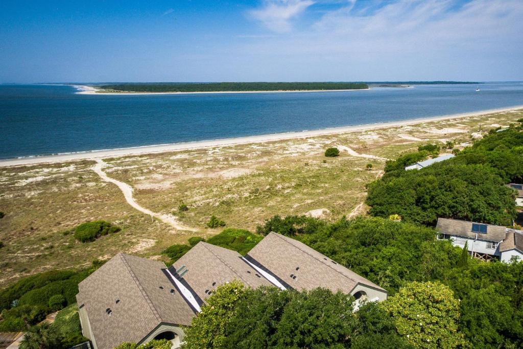 an aerial view of a beach with houses and the ocean at 13104 Pelican Watch in Seabrook Island