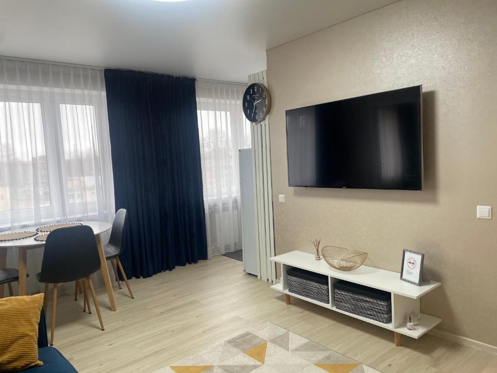 TV a/nebo společenská místnost v ubytování Like a home Voidu