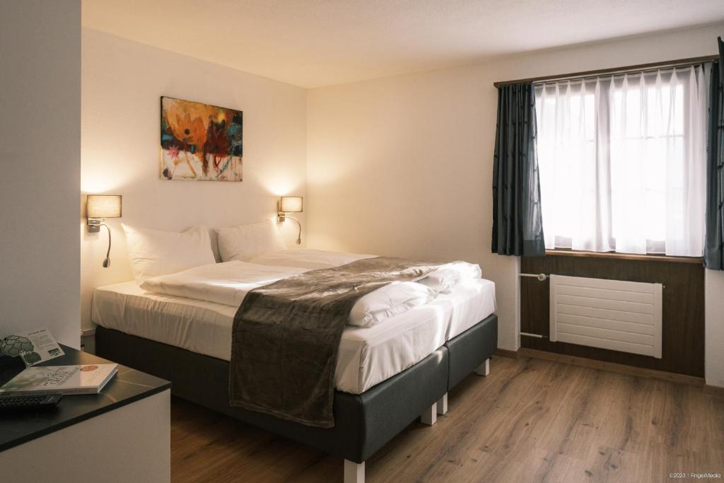 Postel nebo postele na pokoji v ubytování Gasthof Tenne