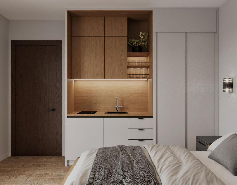 Un pat sau paturi într-o cameră la Apartments Budva Center 2
